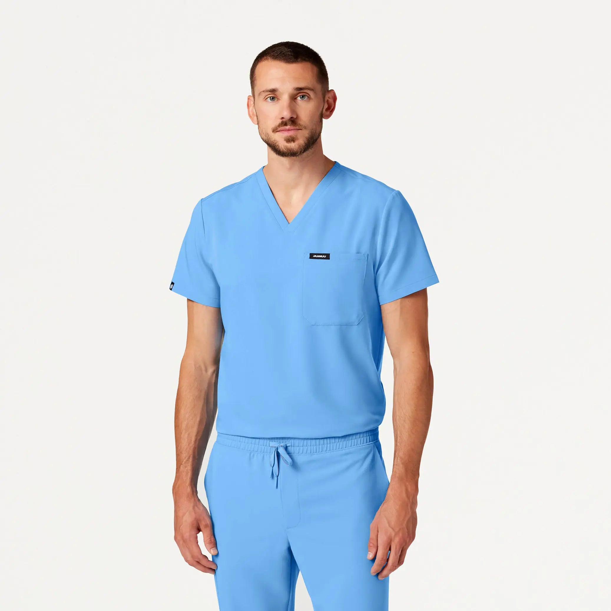 Jaanuu Men's Holmes Everyday 1-Pocket Scrub Top - Sky Blue